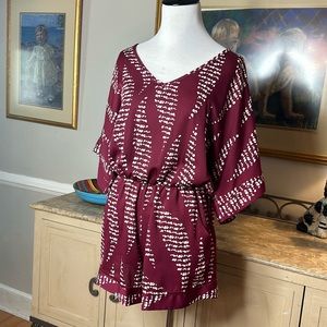 Fab’rik shorts romper in garnet.